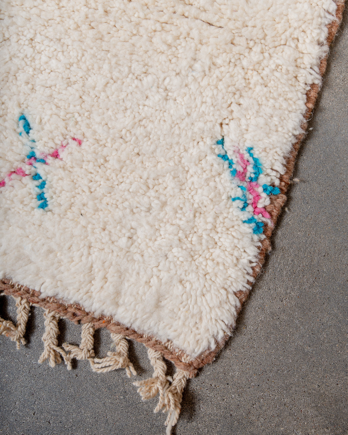 Modern, designer, handcrafted Berber rug from Morocco. Beniourain carpet with beautiful colours and patterns and fluffy wool texture.